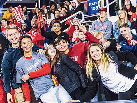 A group of students attending a football game.