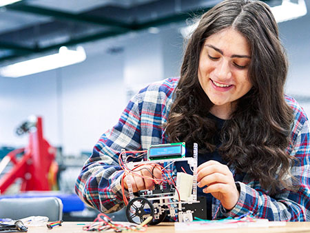 A student working on an engineering project.