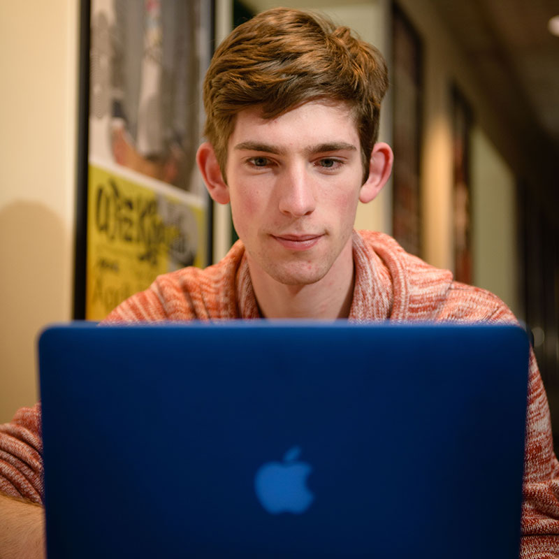 Student using a Computer at Stony Brook University